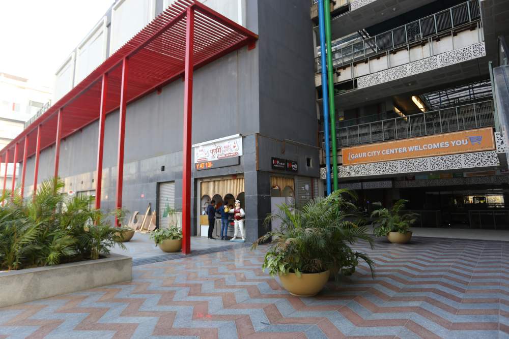 Gaur City Center Landscaped Plaza Walkway
